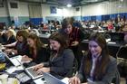Making news: Elise Tollefson in the press filing room at the first New Hampshire GOP debate.